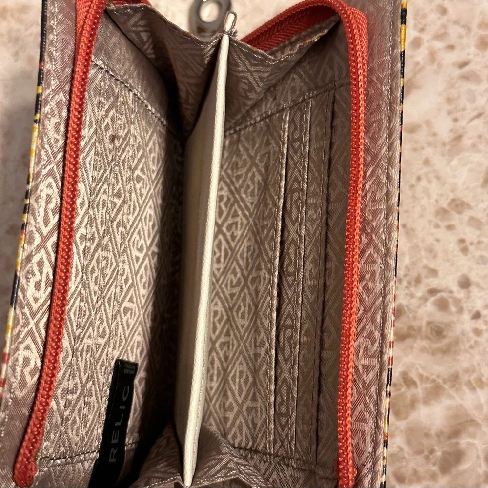 Relic tropical clutch wallet